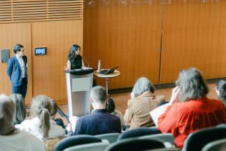 Renisa Mawani giving a keynote